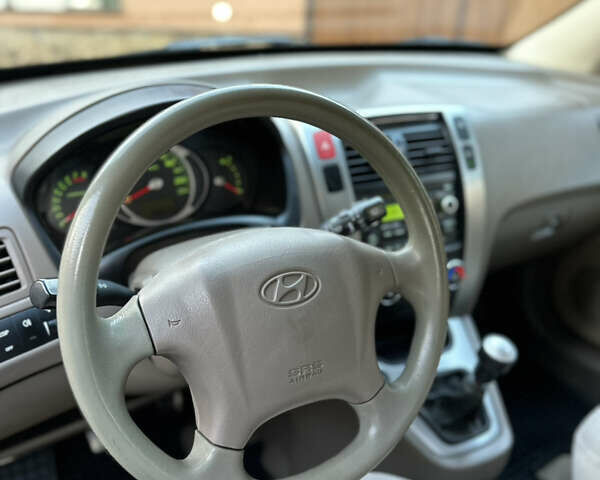 Хендай Туксон 2009 в Калуше на Automoto.ua Черный Хендай Туксон, объемом двигателя 1.98 л и пробегом 198 тыс. км за 7500 $, фото 24 на Automoto.ua