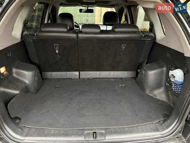 Черный Хендай Туксон, объемом двигателя 2.66 л и пробегом 205 тыс. км за 10000 $, фото 22 на Automoto.ua