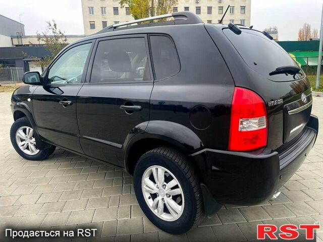 Черный Хендай Туксон, объемом двигателя 2 л и пробегом 168 тыс. км за 7700 $, фото 5 на Automoto.ua