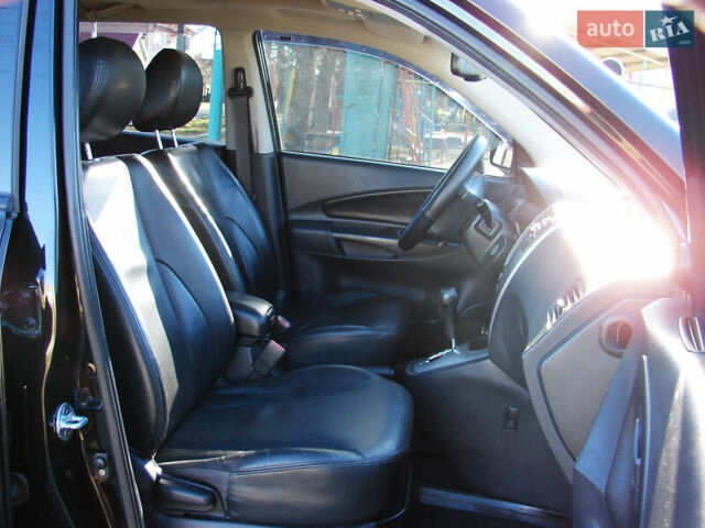 Черный Хендай Туксон, объемом двигателя 2 л и пробегом 162 тыс. км за 8200 $, фото 21 на Automoto.ua