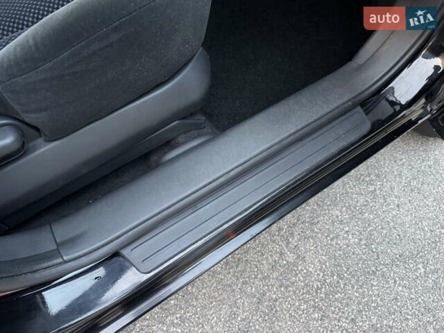 Хендай Туксон 2009 в Киеве на Automoto.ua Черный Хендай Туксон, объемом двигателя 2 л и пробегом 110 тыс. км за 8700 $, фото 12 на Automoto.ua