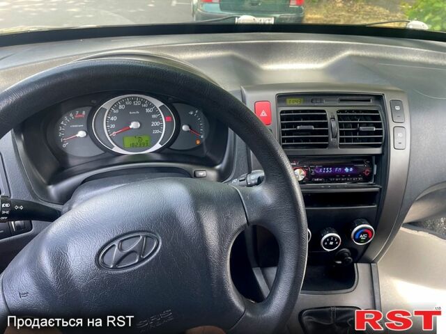 Чорний Хендай Туксон, об'ємом двигуна 2 л та пробігом 182 тис. км за 8700 $, фото 5 на Automoto.ua