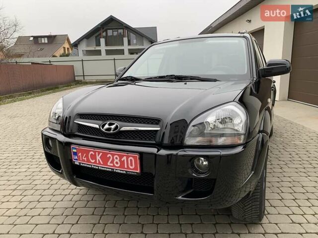 Черный Хендай Туксон, объемом двигателя 2 л и пробегом 114 тыс. км за 8850 $, фото 2 на Automoto.ua