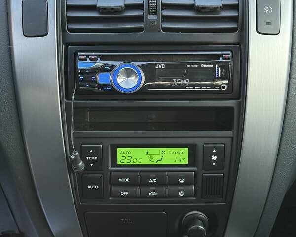 Черный Хендай Туксон, объемом двигателя 2 л и пробегом 110 тыс. км за 8899 $, фото 27 на Automoto.ua