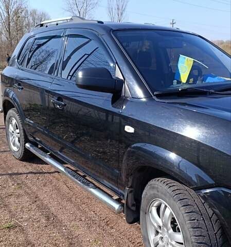 Черный Хендай Туксон, объемом двигателя 2 л и пробегом 226 тыс. км за 8700 $, фото 21 на Automoto.ua