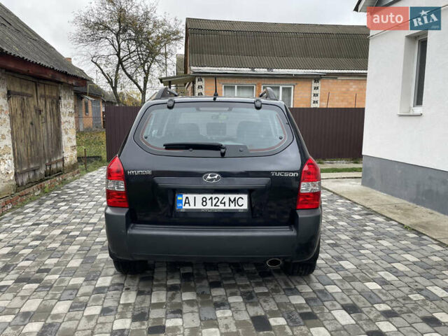Чорний Хендай Туксон, об'ємом двигуна 2 л та пробігом 200 тис. км за 8450 $, фото 6 на Automoto.ua