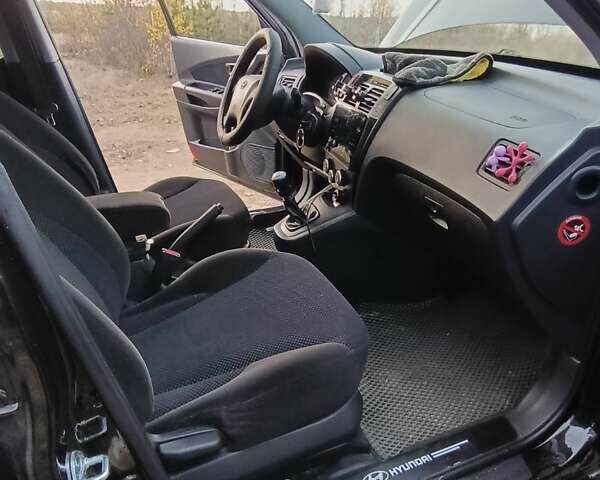 Чорний Хендай Туксон, об'ємом двигуна 1.98 л та пробігом 172 тис. км за 9500 $, фото 15 на Automoto.ua