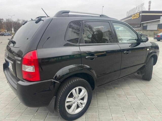 Черный Хендай Туксон, объемом двигателя 2 л и пробегом 168 тыс. км за 7500 $, фото 4 на Automoto.ua
