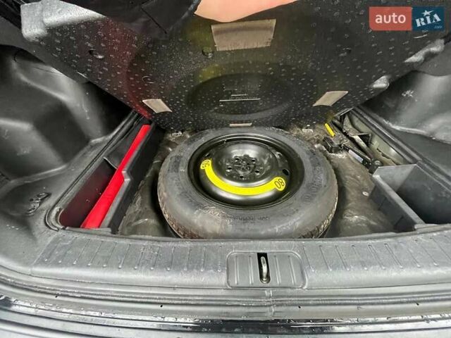 Черный Хендай Туксон, объемом двигателя 2 л и пробегом 128 тыс. км за 9200 $, фото 18 на Automoto.ua