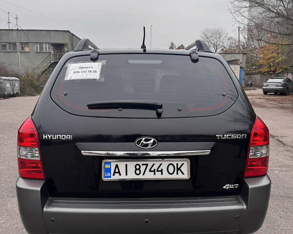 Черный Хендай Туксон, объемом двигателя 1.98 л и пробегом 120 тыс. км за 8500 $, фото 4 на Automoto.ua