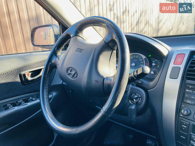 Черный Хендай Туксон, объемом двигателя 1.99 л и пробегом 95 тыс. км за 8500 $, фото 13 на Automoto.ua