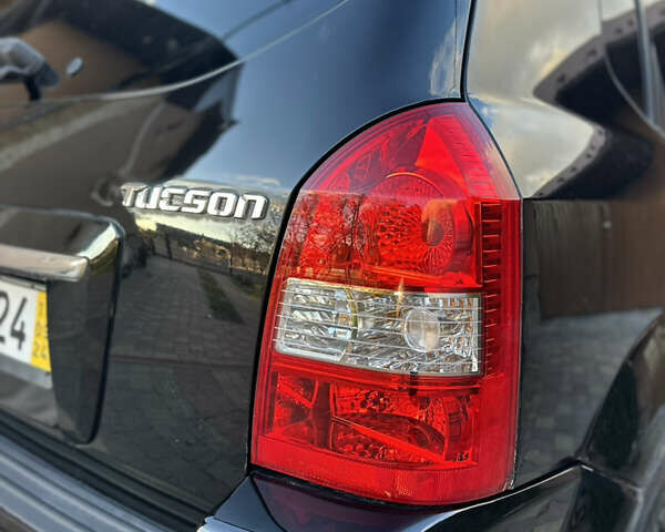 Хендай Туксон 2009 в Калуше на Automoto.ua Черный Хендай Туксон, объемом двигателя 1.98 л и пробегом 198 тыс. км за 7500 $, фото 20 на Automoto.ua