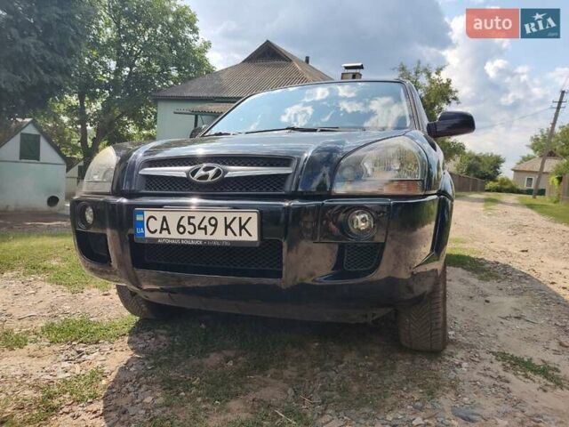 Чорний Хендай Туксон, об'ємом двигуна 1.98 л та пробігом 145 тис. км за 10000 $, фото 3 на Automoto.ua