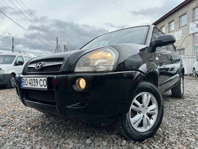 Черный Хендай Туксон, объемом двигателя 2 л и пробегом 166 тыс. км за 7500 $, фото 1 на Automoto.ua