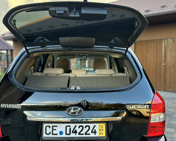 Хендай Туксон 2009 в Калуше на Automoto.ua Черный Хендай Туксон, объемом двигателя 1.98 л и пробегом 198 тыс. км за 7500 $, фото 18 на Automoto.ua