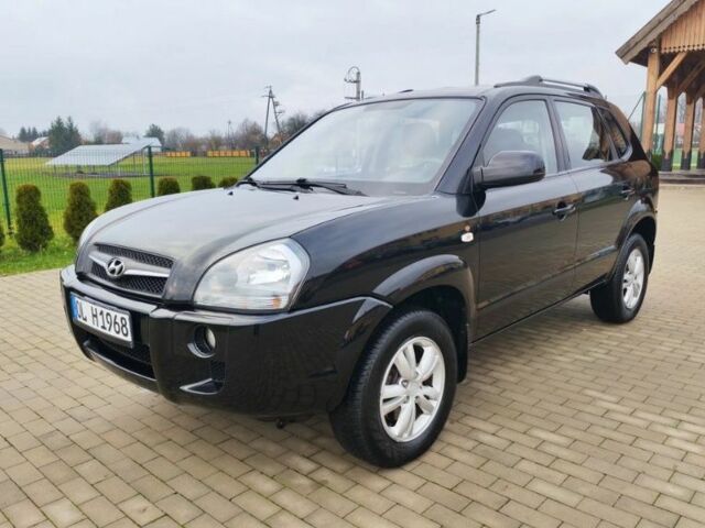 Чорний Хендай Туксон, об'ємом двигуна 1.98 л та пробігом 148 тис. км за 6199 $, фото 2 на Automoto.ua