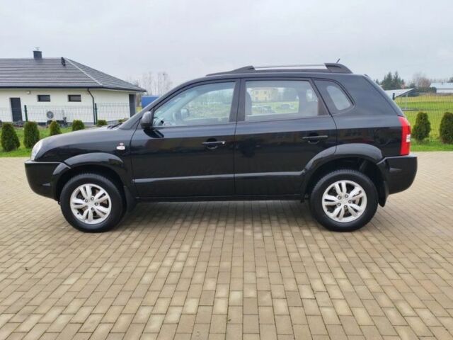 Чорний Хендай Туксон, об'ємом двигуна 1.98 л та пробігом 148 тис. км за 6199 $, фото 3 на Automoto.ua