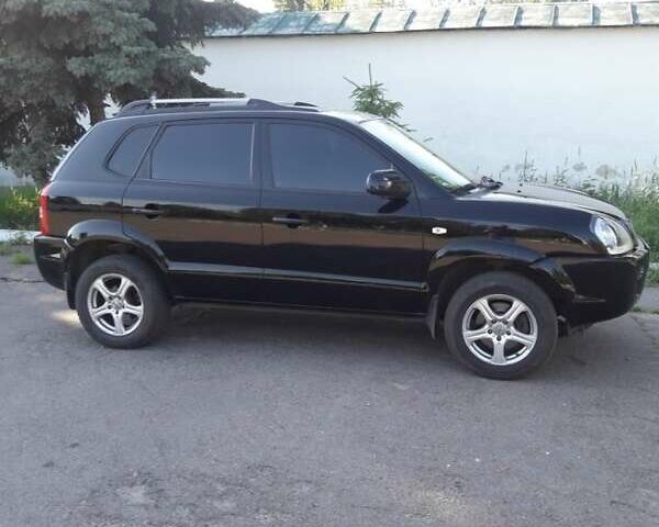 Черный Хендай Туксон, объемом двигателя 2 л и пробегом 220 тыс. км за 7500 $, фото 3 на Automoto.ua