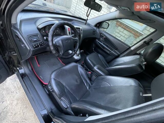 Чорний Хендай Туксон, об'ємом двигуна 2.66 л та пробігом 177 тис. км за 8800 $, фото 4 на Automoto.ua