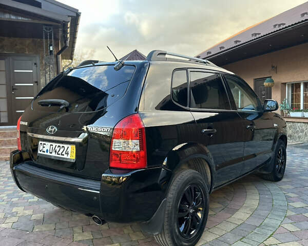 Хендай Туксон 2009 в Калуше на Automoto.ua Черный Хендай Туксон, объемом двигателя 1.98 л и пробегом 198 тыс. км за 7500 $, фото 4 на Automoto.ua