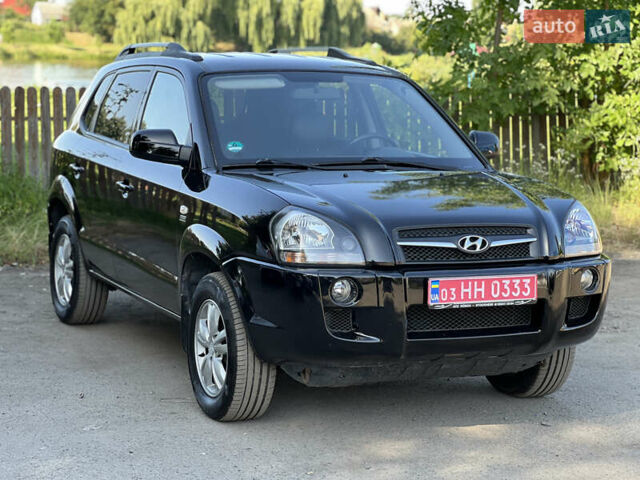 Черный Хендай Туксон, объемом двигателя 2 л и пробегом 243 тыс. км за 8000 $, фото 18 на Automoto.ua