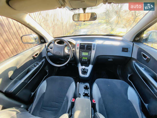 Черный Хендай Туксон, объемом двигателя 1.99 л и пробегом 95 тыс. км за 8500 $, фото 19 на Automoto.ua