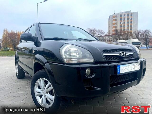 Черный Хендай Туксон, объемом двигателя 2 л и пробегом 168 тыс. км за 7700 $, фото 3 на Automoto.ua