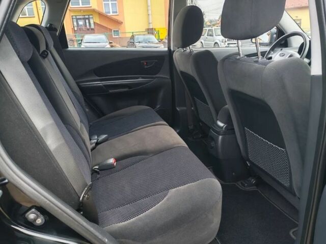 Чорний Хендай Туксон, об'ємом двигуна 1.98 л та пробігом 148 тис. км за 6199 $, фото 13 на Automoto.ua