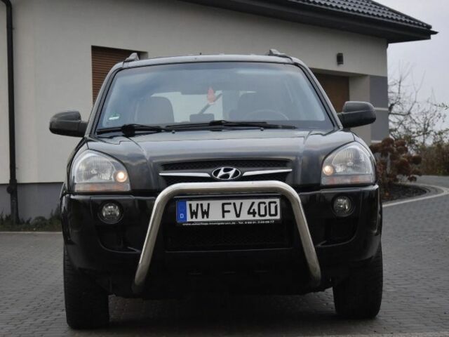 Черный Хендай Туксон, объемом двигателя 2 л и пробегом 184 тыс. км за 5480 $, фото 2 на Automoto.ua