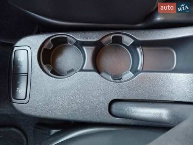 Черный Хендай Туксон, объемом двигателя 1.99 л и пробегом 159 тыс. км за 9700 $, фото 18 на Automoto.ua