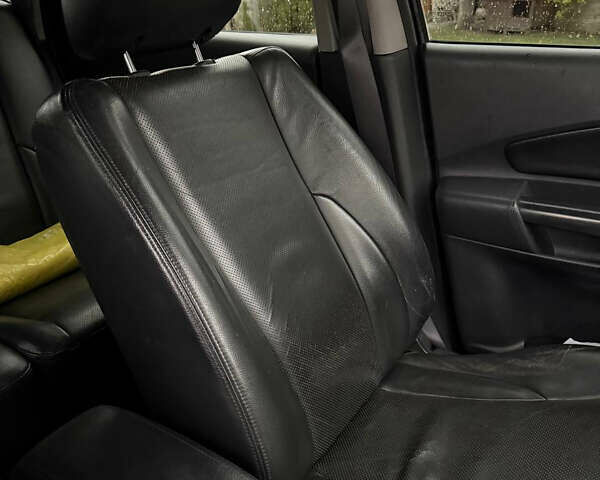 Черный Хендай Туксон, объемом двигателя 2.66 л и пробегом 205 тыс. км за 10000 $, фото 70 на Automoto.ua