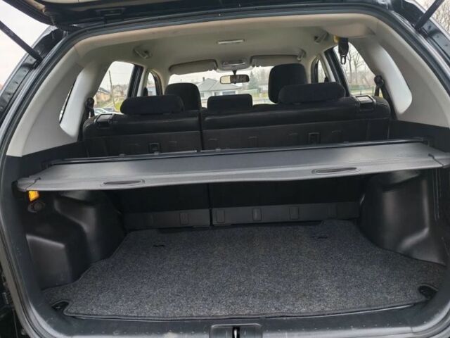 Чорний Хендай Туксон, об'ємом двигуна 1.98 л та пробігом 148 тис. км за 6199 $, фото 14 на Automoto.ua