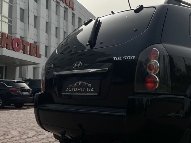 Черный Хендай Туксон, объемом двигателя 2 л и пробегом 200 тыс. км за 8999 $, фото 18 на Automoto.ua