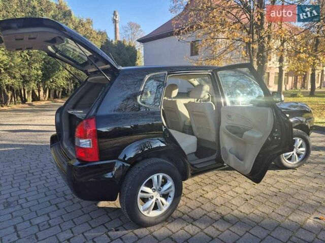 Чорний Хендай Туксон, об'ємом двигуна 2 л та пробігом 187 тис. км за 7900 $, фото 5 на Automoto.ua