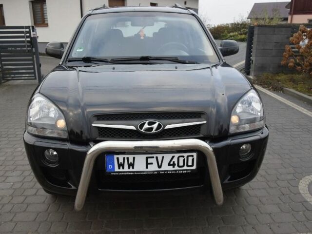 Черный Хендай Туксон, объемом двигателя 2 л и пробегом 184 тыс. км за 5480 $, фото 6 на Automoto.ua