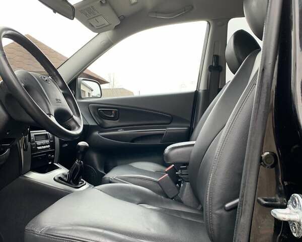 Черный Хендай Туксон, объемом двигателя 2 л и пробегом 114 тыс. км за 8850 $, фото 41 на Automoto.ua