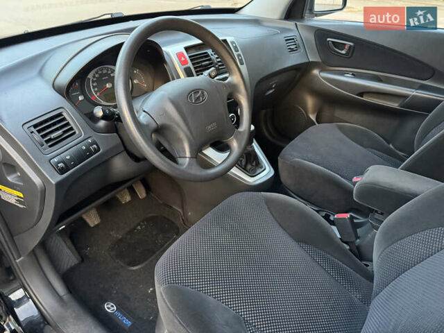 Хендай Туксон 2009 в Киеве на Automoto.ua Черный Хендай Туксон, объемом двигателя 2 л и пробегом 110 тыс. км за 8700 $, фото 24 на Automoto.ua