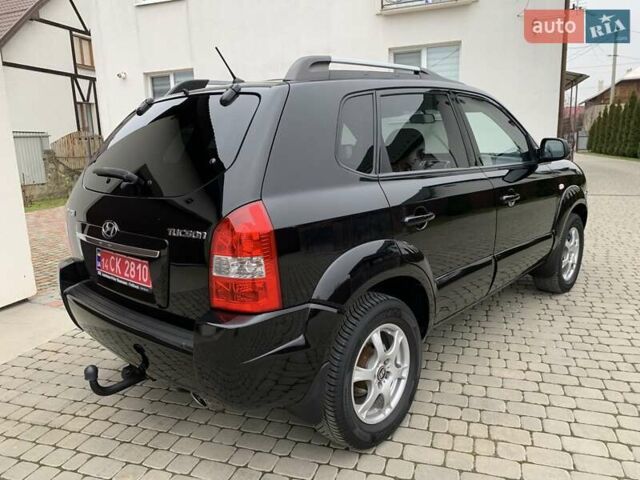 Черный Хендай Туксон, объемом двигателя 2 л и пробегом 114 тыс. км за 8850 $, фото 8 на Automoto.ua