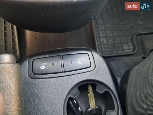Черный Хендай Туксон, объемом двигателя 1.98 л и пробегом 233 тыс. км за 7850 $, фото 16 на Automoto.ua