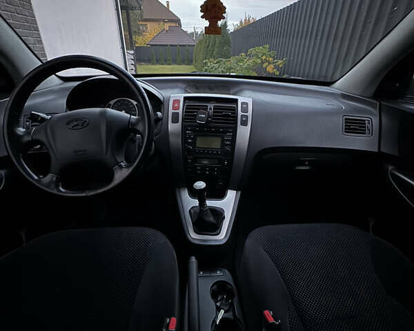 Чорний Хендай Туксон, об'ємом двигуна 1.98 л та пробігом 200 тис. км за 8200 $, фото 5 на Automoto.ua