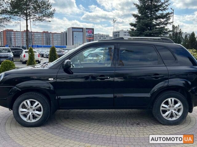 Чорний Хендай Туксон, об'ємом двигуна 2 л та пробігом 246 тис. км за 7999 $, фото 3 на Automoto.ua