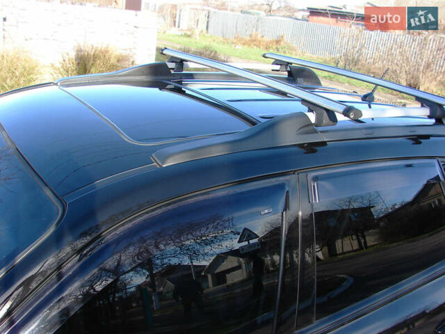 Черный Хендай Туксон, объемом двигателя 2 л и пробегом 162 тыс. км за 8200 $, фото 2 на Automoto.ua