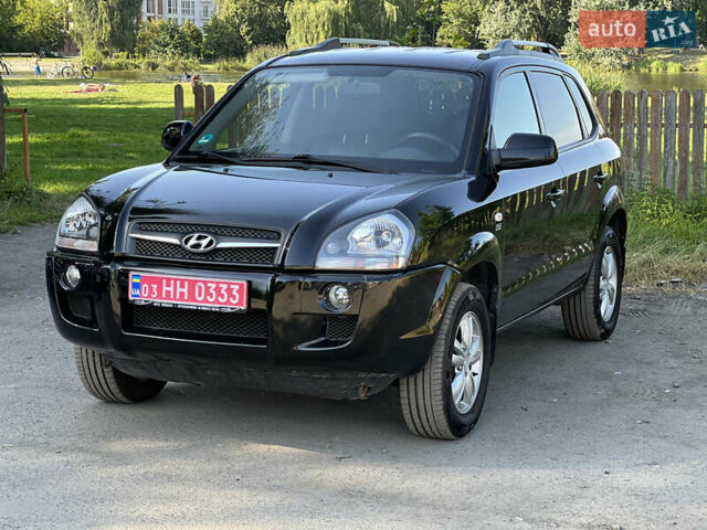 Черный Хендай Туксон, объемом двигателя 2 л и пробегом 243 тыс. км за 8000 $, фото 4 на Automoto.ua