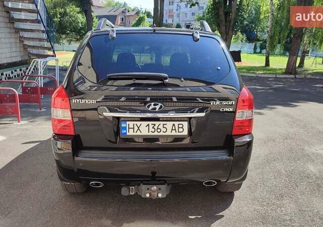 Чорний Хендай Туксон, об'ємом двигуна 2 л та пробігом 157 тис. км за 10000 $, фото 2 на Automoto.ua
