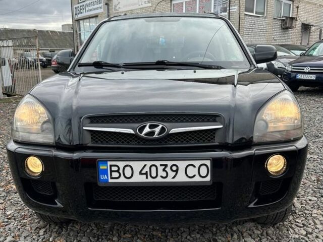 Черный Хендай Туксон, объемом двигателя 2 л и пробегом 166 тыс. км за 7500 $, фото 4 на Automoto.ua