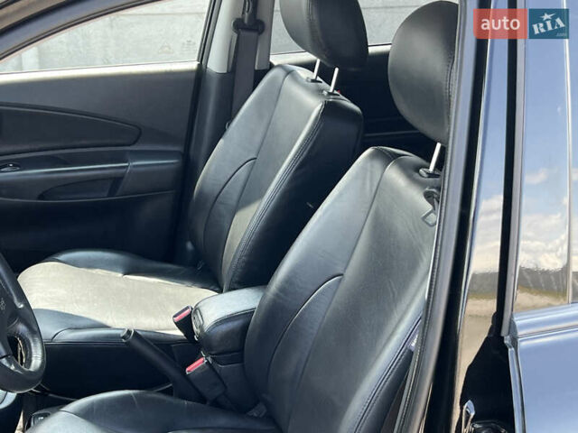 Чорний Хендай Туксон, об'ємом двигуна 2 л та пробігом 163 тис. км за 9199 $, фото 25 на Automoto.ua