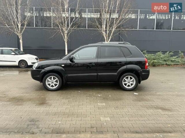 Черный Хендай Туксон, объемом двигателя 2 л и пробегом 237 тыс. км за 8350 $, фото 8 на Automoto.ua