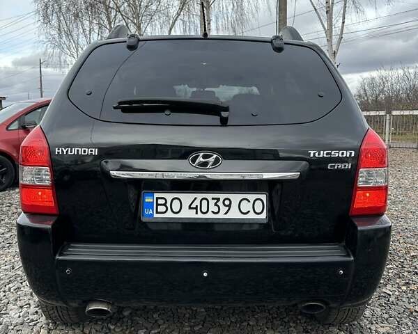 Чорний Хендай Туксон, об'ємом двигуна 2 л та пробігом 166 тис. км за 7500 $, фото 4 на Automoto.ua