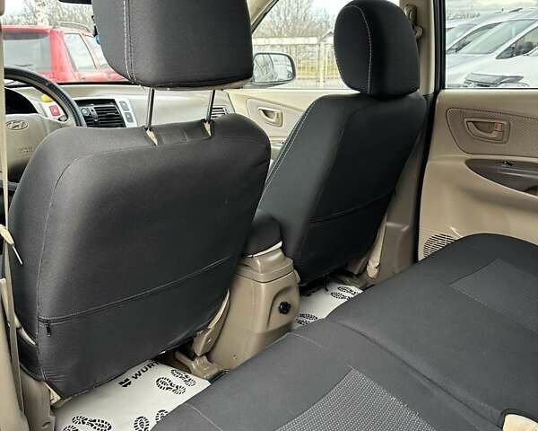 Чорний Хендай Туксон, об'ємом двигуна 2 л та пробігом 166 тис. км за 7500 $, фото 12 на Automoto.ua