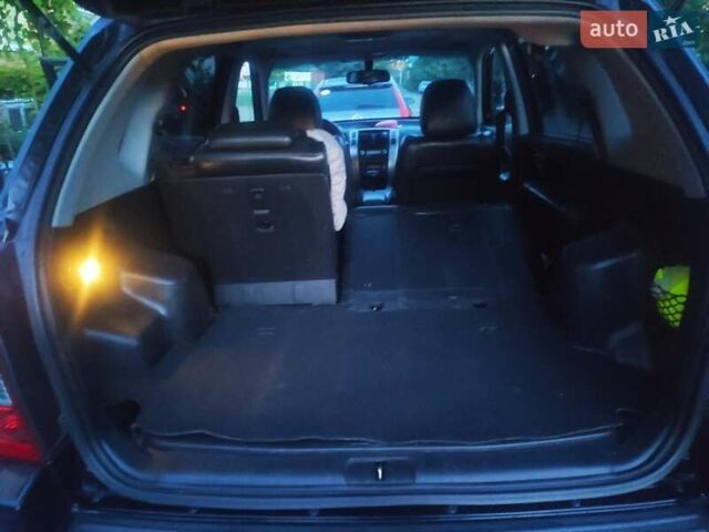 Черный Хендай Туксон, объемом двигателя 2 л и пробегом 271 тыс. км за 7777 $, фото 10 на Automoto.ua